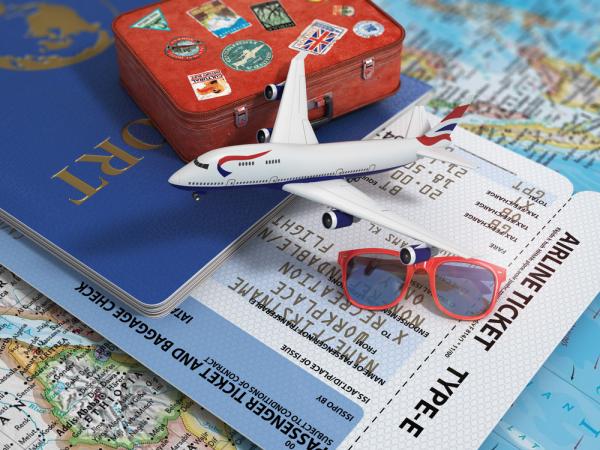 airplane tickets and passport picture