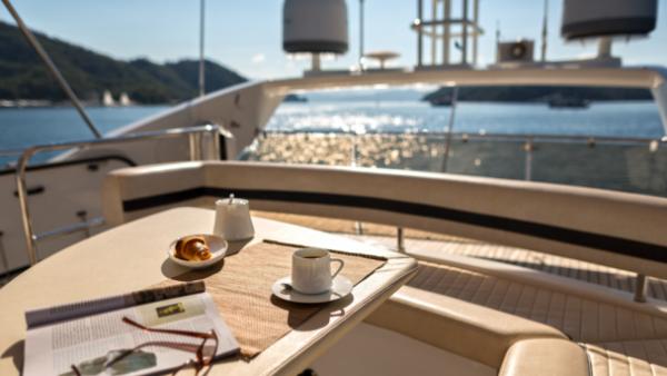 morning coffee and magazines in a yacht