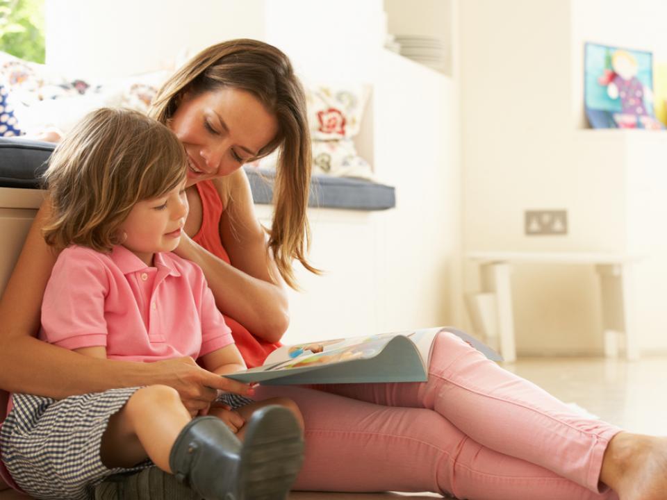 mother daughter reading book